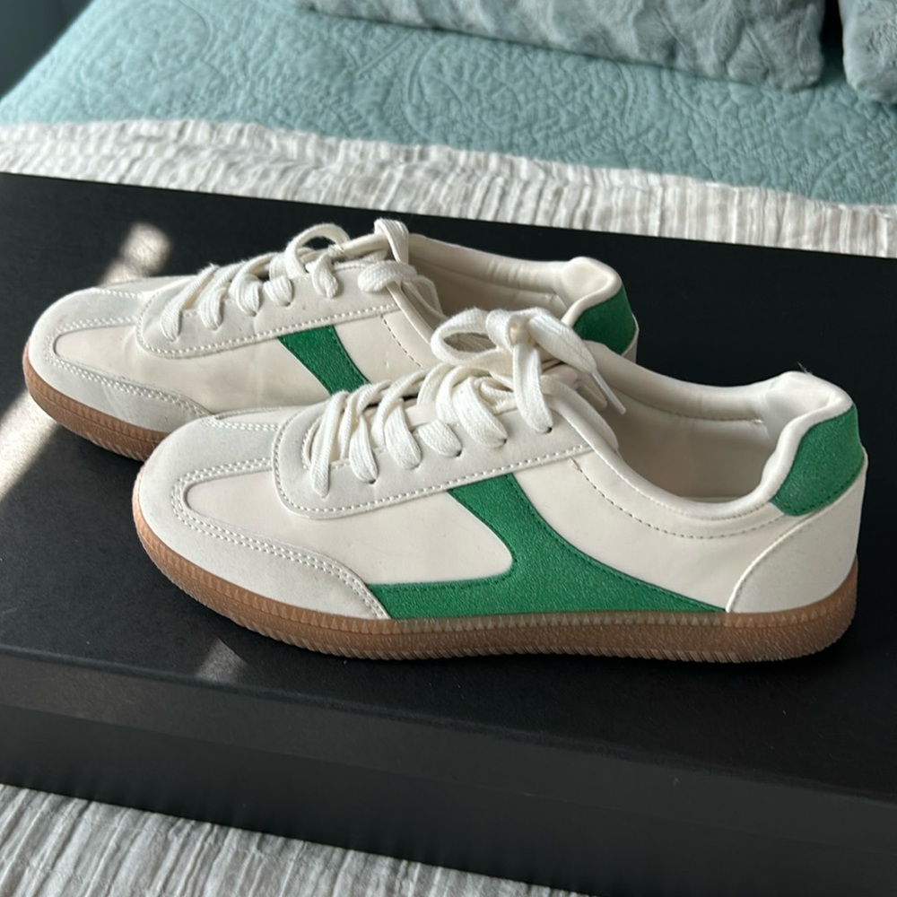 White and green court shoe